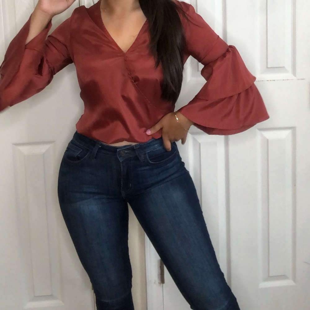 Burnt red colored top